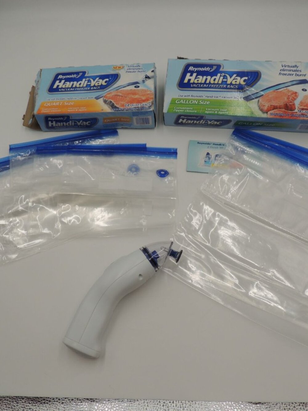 Reynolds Handi-Vac gallon quart and vacuum sealer discontinued